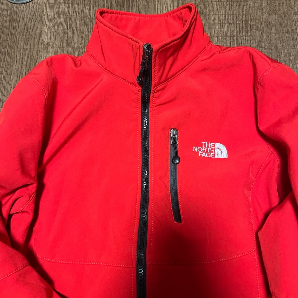 Red Northface zip up
